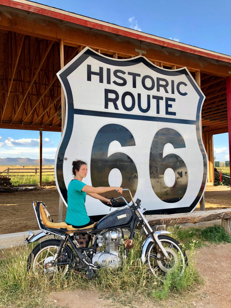Lori in front of historic Route 66 sign